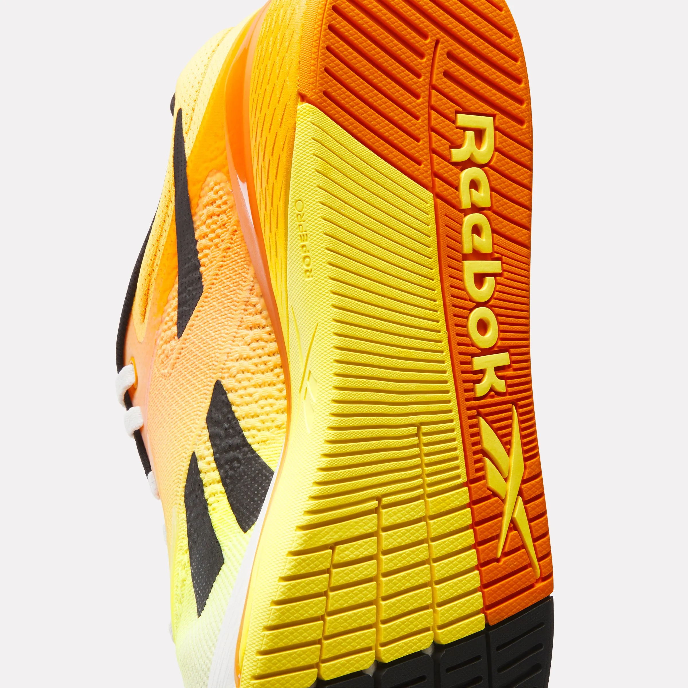 REEBOK - NANO X5 - CHALK/BLACK/ELECTRIC AMBER