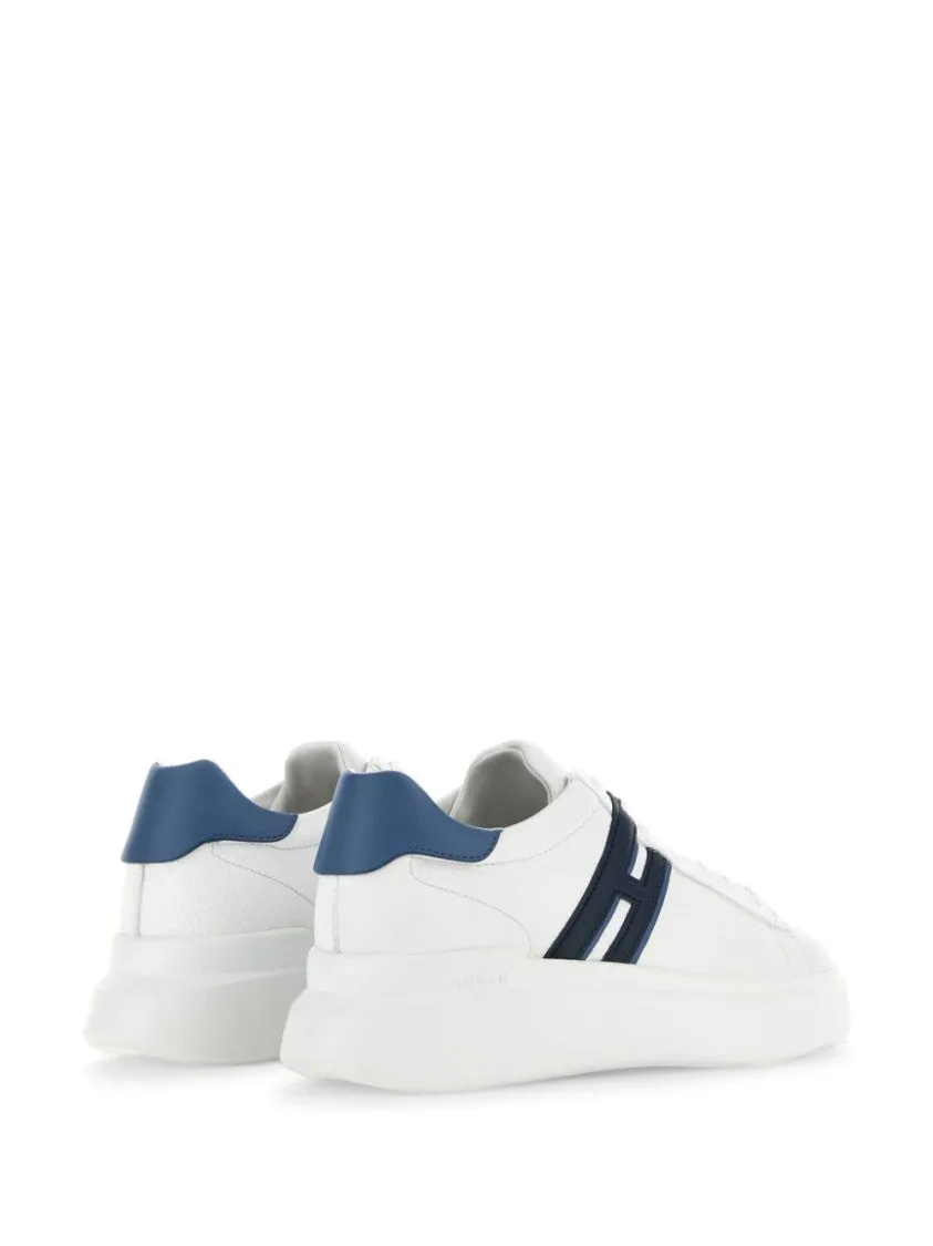 White Leather Sneakers With Navy Accents And Sole